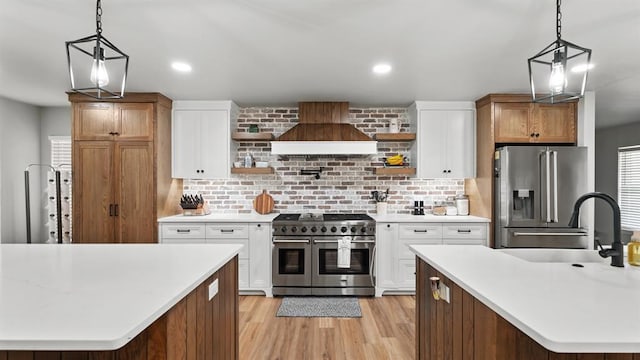 10506 W Smith Rd, El Reno, OK 73036 - kitchen featuring stainless steel appliances, custom exhaust hood, open shelves, light wood-style floors, and recessed lighting