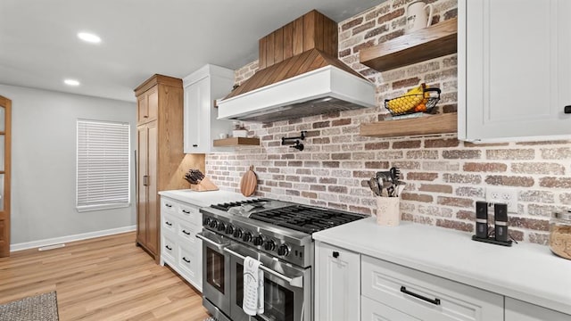10506 W Smith Rd, El Reno, OK 73036 - kitchen featuring double oven range, open shelves, decorative backsplash, light countertops, and recessed lighting
