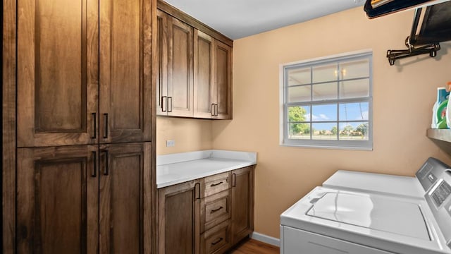 10506 W Smith Rd, El Reno, OK 73036 - laundry area featuring cabinet space and independent washer and dryer