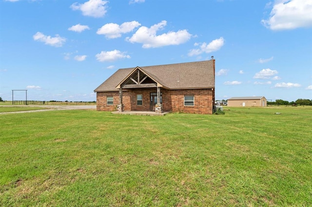 3895 NE Arrowhead Rd, Piedmont, OK 73078 - craftsman house with a front yard, brick siding, and a patio