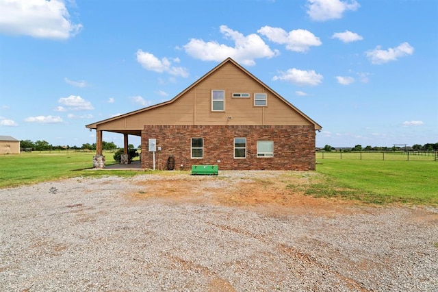 3895 NE Arrowhead Rd, Piedmont, OK 73078 - view of property exterior featuring brick siding and driveway