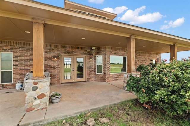 3895 NE Arrowhead Rd, Piedmont, OK 73078 - view of patio / terrace featuring french doors