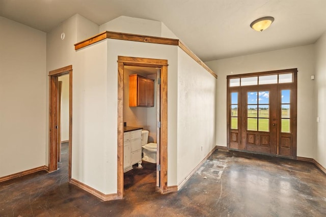 3895 NE Arrowhead Rd, Piedmont, OK 73078 - foyer with concrete flooring and baseboards