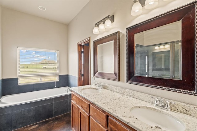 3895 NE Arrowhead Rd, Piedmont, OK 73078 - bathroom featuring double vanity and a garden tub