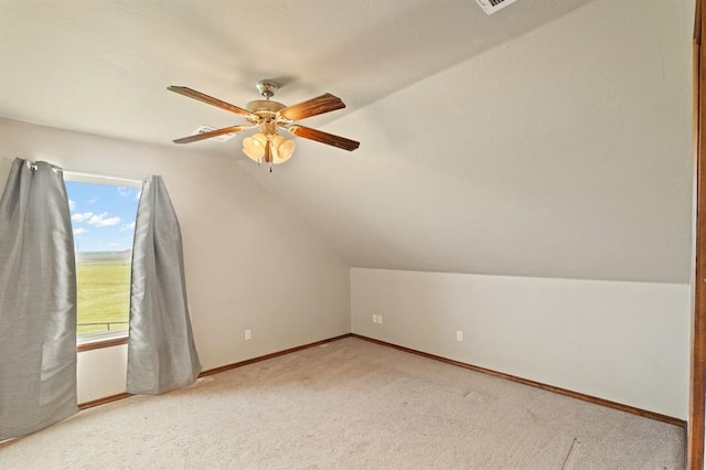 3895 NE Arrowhead Rd, Piedmont, OK 73078 - additional living space with vaulted ceiling, a ceiling fan, and carpet floors