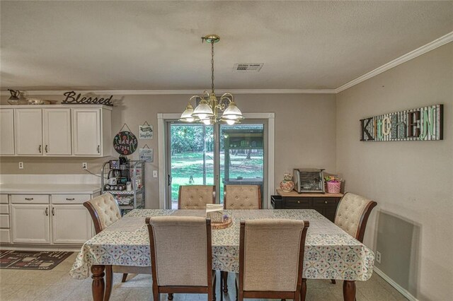 13086 240th, Blanchard, OK 73010 - dining space featuring a chandelier and ornamental molding