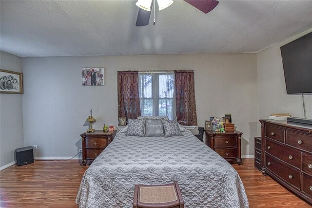 13086 240th, Blanchard, OK 73010 - bedroom featuring wood finished floors and a ceiling fan