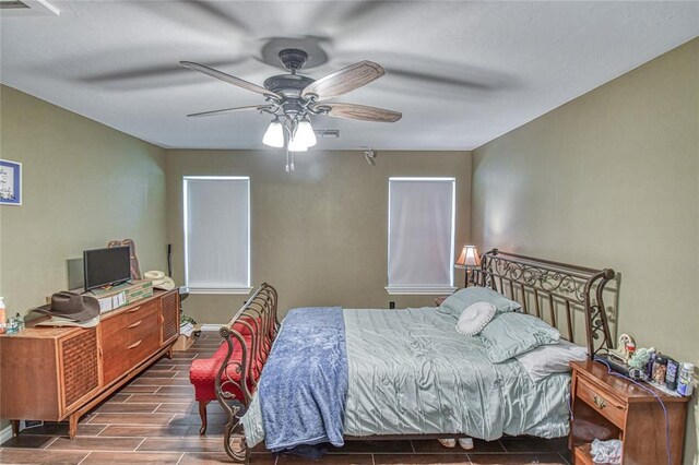 13086 240th, Blanchard, OK 73010 - bedroom featuring wood finished floors and ceiling fan