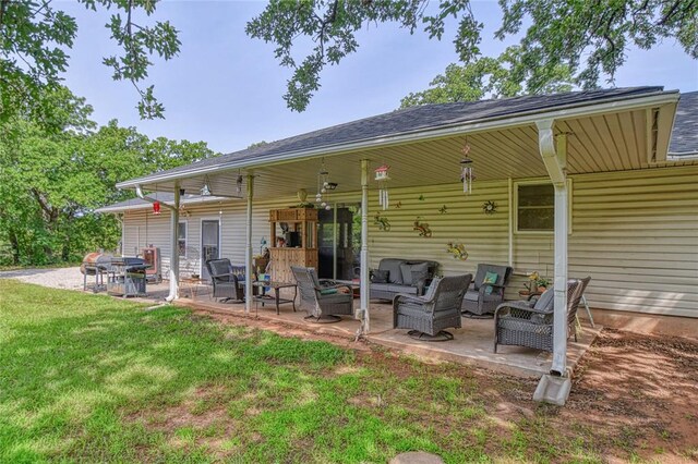 13086 240th, Blanchard, OK 73010 - rear view of property featuring an outdoor living space, a patio area, and a yard