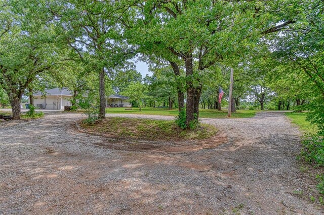 13086 240th, Blanchard, OK 73010 - view of yard featuring curved driveway