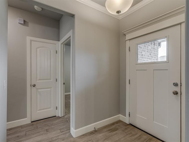 3713 Andrew Ct, Norman, OK 73072 - foyer entrance featuring light wood finished floors, ornamental molding, and baseboards