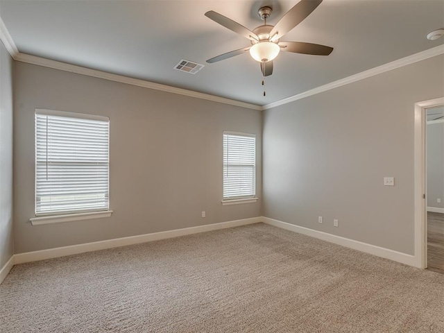 3713 Andrew Ct, Norman, OK 73072 - carpeted empty room with crown molding, baseboards, and a ceiling fan