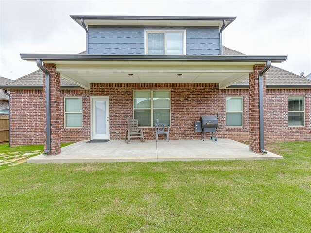 3713 Andrew Ct, Norman, OK 73072 - rear view of house featuring a patio and brick siding