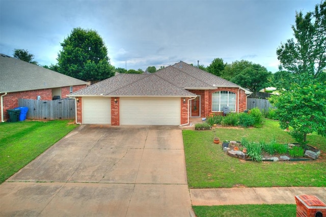 1204 Deer Run Dr, Norman, OK 73071 - single story home with brick siding, an attached garage, and driveway