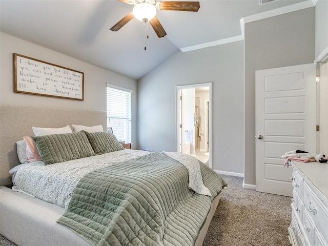 3911 Wiltshire Dr, Norman, OK 73026 - bedroom with lofted ceiling, light carpet, baseboards, a ceiling fan, and connected bathroom