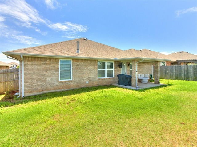 3911 Wiltshire Dr, Norman, OK 73026 - rear view of house featuring a patio area, brick siding, and roof with shingles