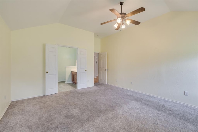 5600 Darla Dr, Oklahoma City, OK 73135 - unfurnished bedroom featuring vaulted ceiling, light colored carpet, ceiling fan, and ensuite bathroom