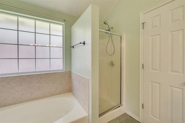 5600 Darla Dr, Oklahoma City, OK 73135 - full bathroom with plenty of natural light, a stall shower, a bath, and tile patterned floors