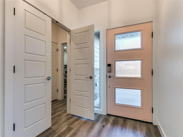 8324 NW 151st Ter, Edmond, OK 73013 - entryway featuring dark wood-type flooring