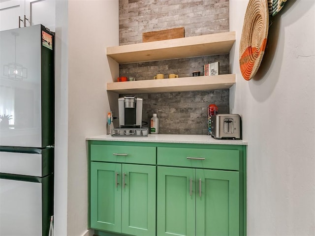 8324 NW 151st Ter, Edmond, OK 73013 - bar with freestanding refrigerator and tasteful backsplash