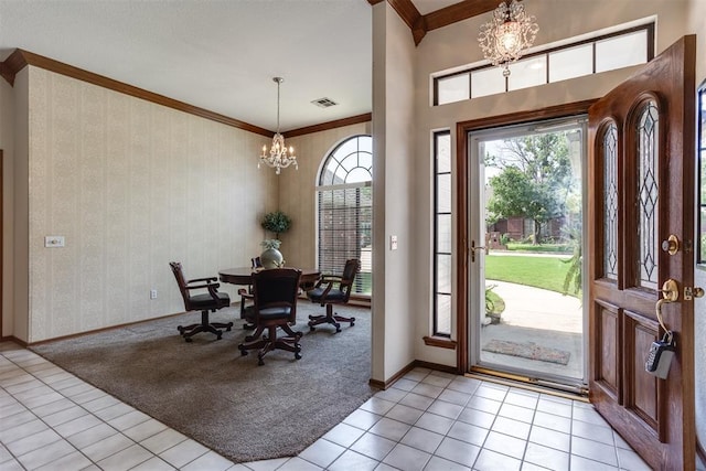12432 Hastings Rd, Midwest City, OK 73130 - foyer featuring crown molding, a chandelier, light colored carpet, and light tile patterned floors