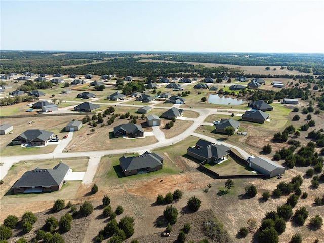 2515 Gallant Fox Ter, Guthrie, OK 73044 - aerial view of property and surrounding area with nearby suburban area and a nearby body of water
