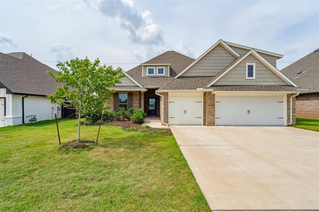 1513 Reid Pryor Rd, Norman, OK 73072 - craftsman inspired home featuring brick siding, an attached garage, driveway, roof with shingles, and a front yard