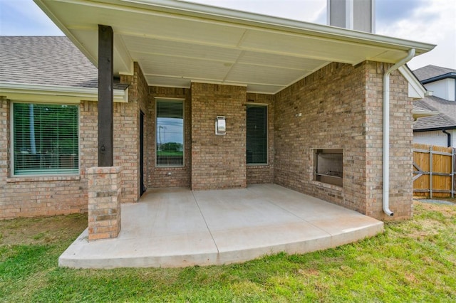 1513 Reid Pryor Rd, Norman, OK 73072 - view of patio / terrace with an outdoor brick fireplace