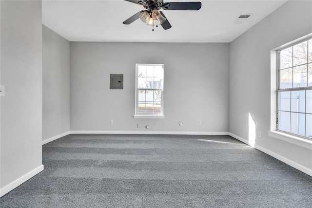 501 SW 2nd St, Tuttle, OK 73089 - unfurnished room with carpet floors, healthy amount of natural light, and electric panel