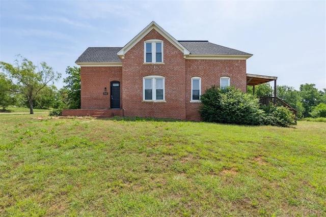 1901 E University Ave, Guthrie, OK 73044 - view of front of home with a front lawn and brick siding