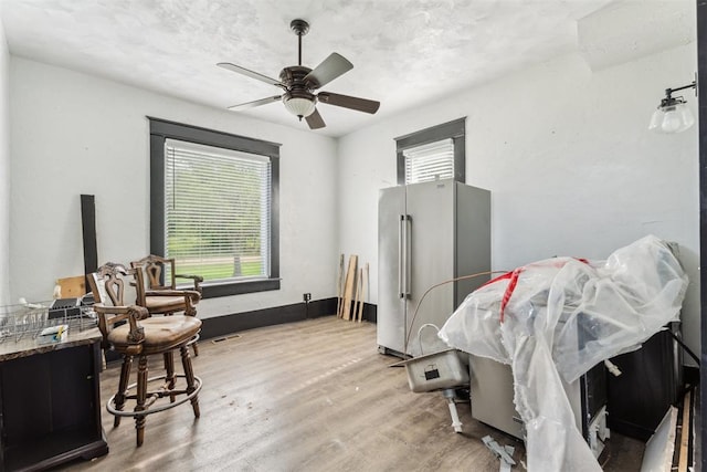 1901 E University Ave, Guthrie, OK 73044 - interior space featuring light wood-type flooring and ceiling fan