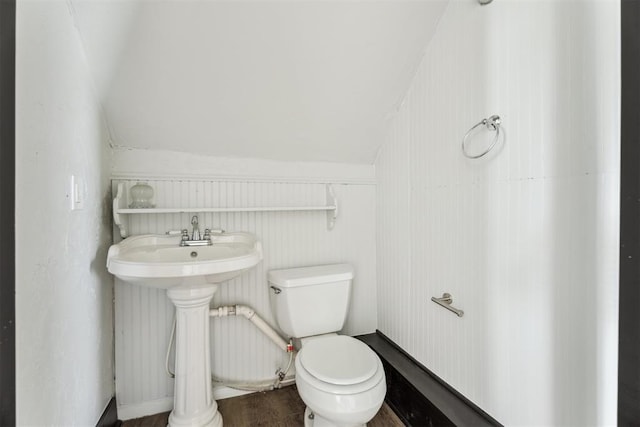 1901 E University Ave, Guthrie, OK 73044 - half bathroom with toilet and vaulted ceiling