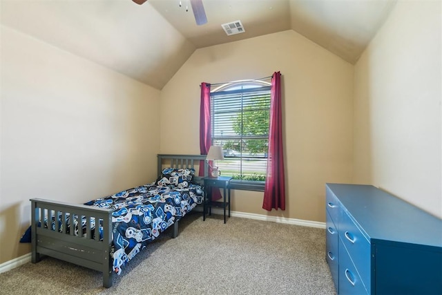 bedroom featuring carpet flooring, baseboards, vaulted ceiling, and ceiling fan