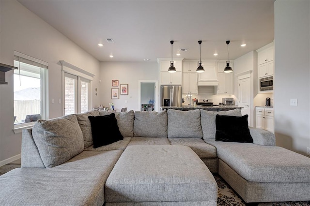 3413 NW 159th St, Edmond, OK 73013 - living room featuring recessed lighting