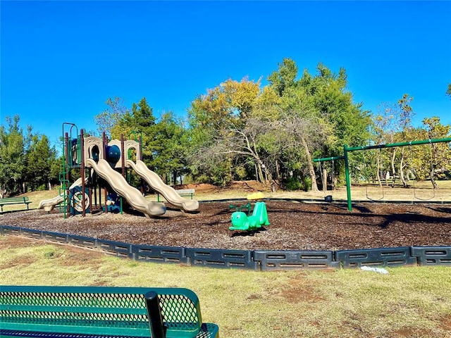 12016 SW 50th St, Mustang, OK 73064 - communal playground featuring view of scattered trees