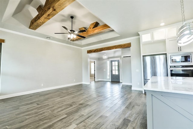 12016 SW 50th St, Mustang, OK 73064 - unfurnished living room featuring ceiling fan, beam ceiling, wood finished floors, and ornamental molding