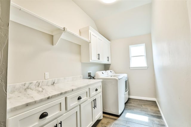 12016 SW 50th St, Mustang, OK 73064 - washroom featuring cabinet space, washing machine and clothes dryer, and wood finished floors