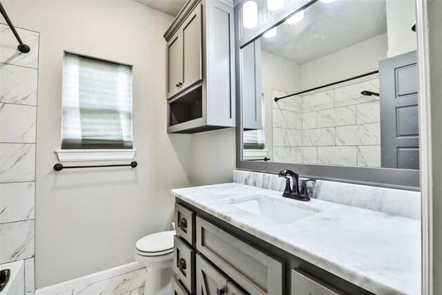 12016 SW 50th St, Mustang, OK 73064 - full bathroom featuring marble finish flooring, vanity, and washtub / shower combination