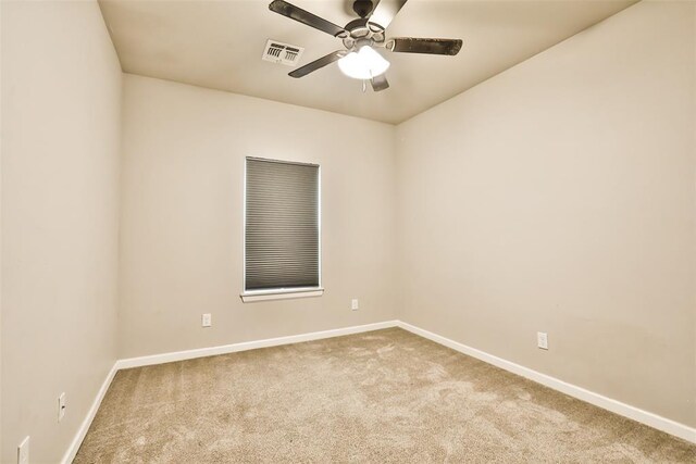 12016 SW 50th St, Mustang, OK 73064 - spare room featuring carpet flooring and a ceiling fan