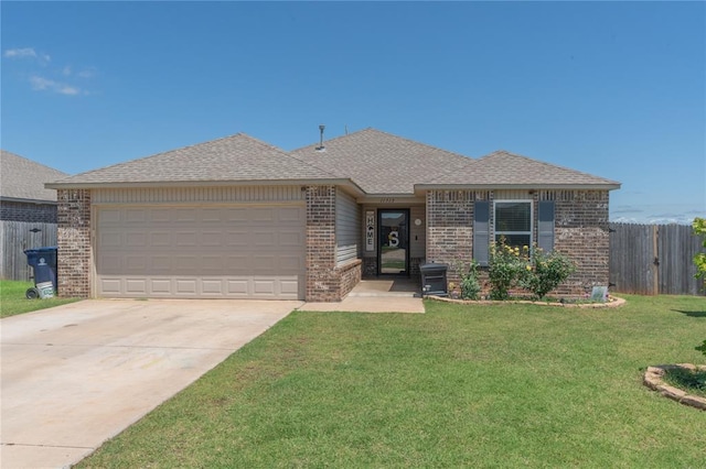 11513 Ruger Rd, Yukon, OK 73099 - ranch-style home featuring brick siding, a garage, driveway, and a shingled roof