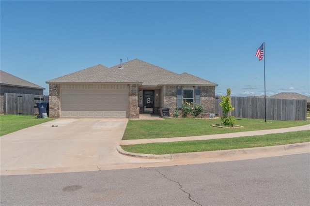 11513 Ruger Rd, Yukon, OK 73099 - ranch-style home with brick siding, an attached garage, and concrete driveway