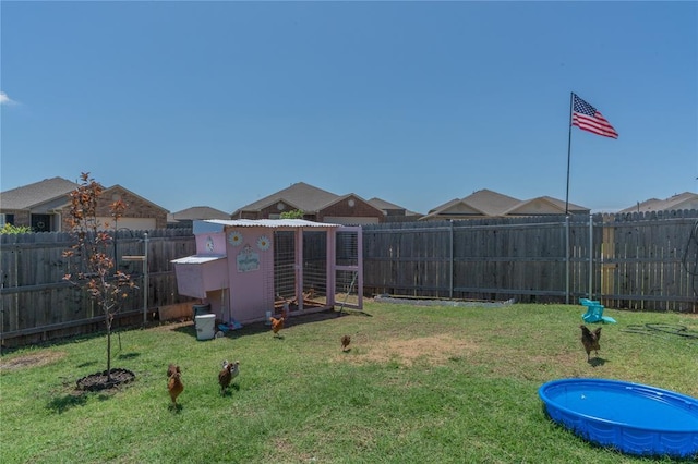11513 Ruger Rd, Yukon, OK 73099 - view of yard featuring exterior structure