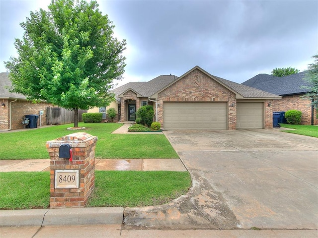 8409 Heather Glen Dr, Yukon, OK 73099 - view of front of home featuring an attached garage, driveway, brick siding, and roof with shingles