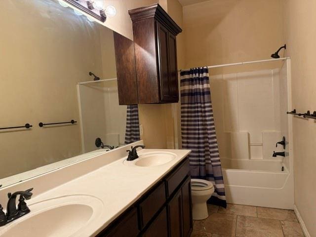 1523 Morland St, Norman, OK 73071 - bathroom with shower / bath combination with curtain, double vanity, toilet, and baseboards