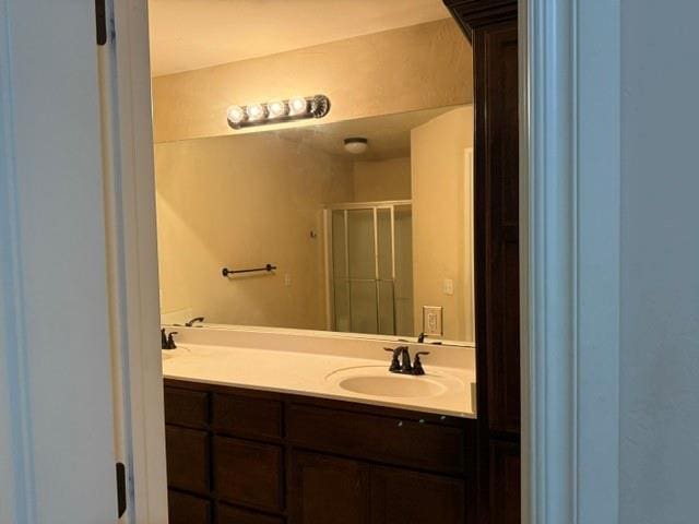 1523 Morland St, Norman, OK 73071 - bathroom with a shower stall and double vanity