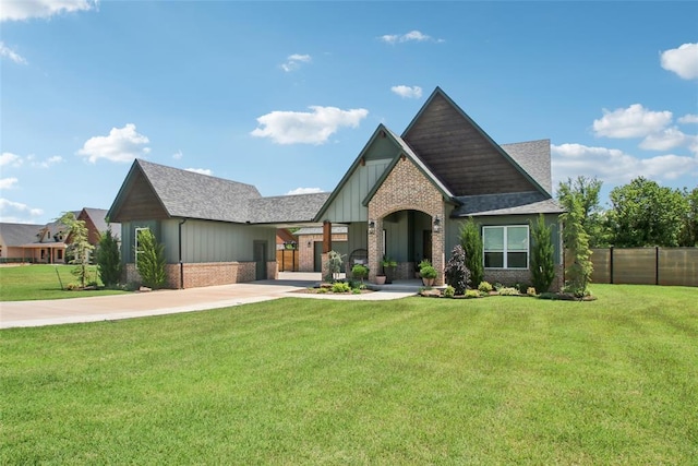 3154 Red Ridge Dr, Blanchard, OK 73010 - craftsman inspired home featuring brick siding, a shingled roof, driveway, and board and batten siding