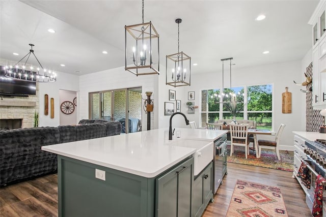 3154 Red Ridge Dr, Blanchard, OK 73010 - kitchen with a chandelier, a sink, light countertops, and recessed lighting