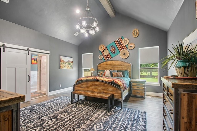 3154 Red Ridge Dr, Blanchard, OK 73010 - bedroom featuring wood finished floors, beam ceiling, baseboards, a barn door, and a chandelier