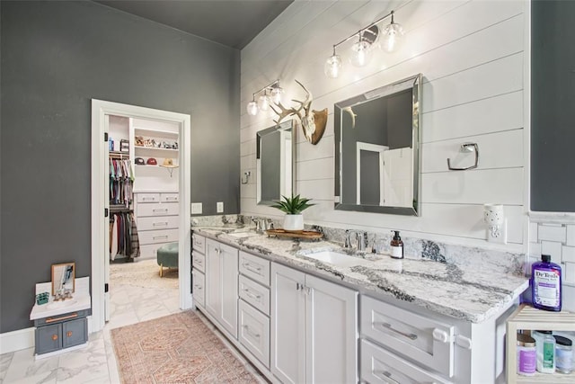 3154 Red Ridge Dr, Blanchard, OK 73010 - full bathroom featuring marble finish flooring, double vanity, and a spacious closet