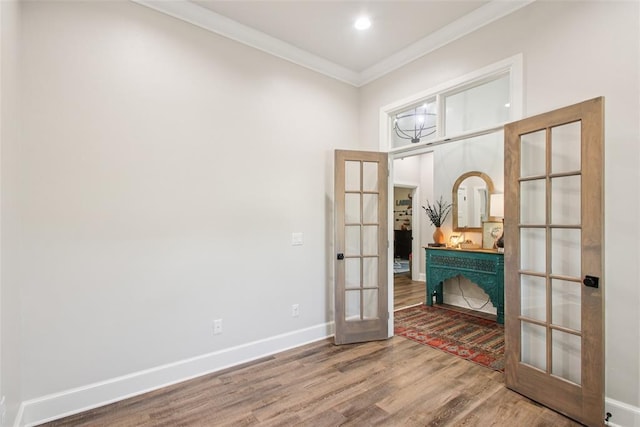 3154 Red Ridge Dr, Blanchard, OK 73010 - spare room with french doors, wood finished floors, ornamental molding, baseboards, and recessed lighting